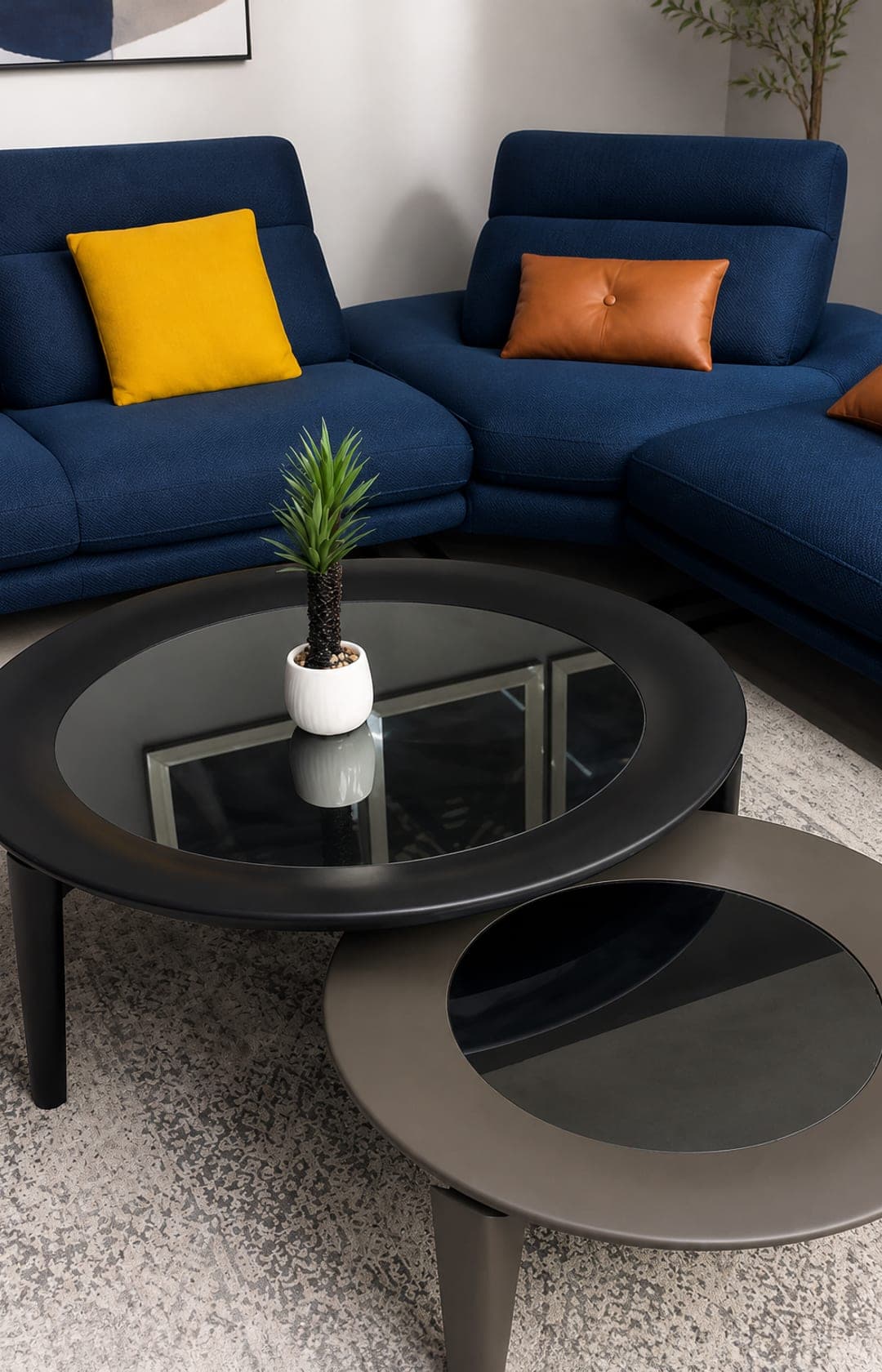 Navy blue salon with nested coffee tables